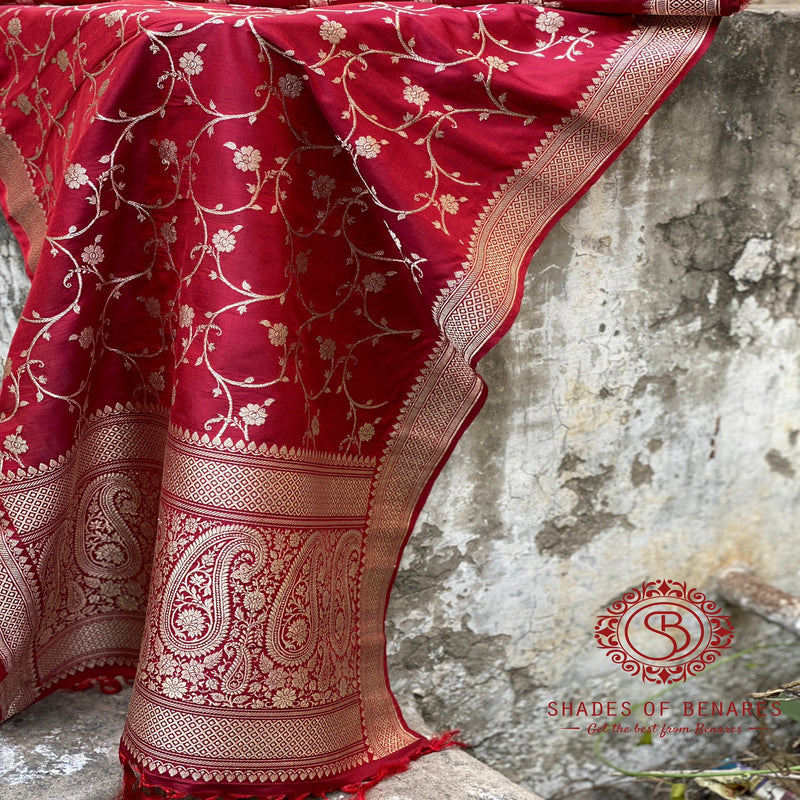 Opulent maroon Banarasi handloom kadhwa silk scarf with intricate designs and rich texture.
