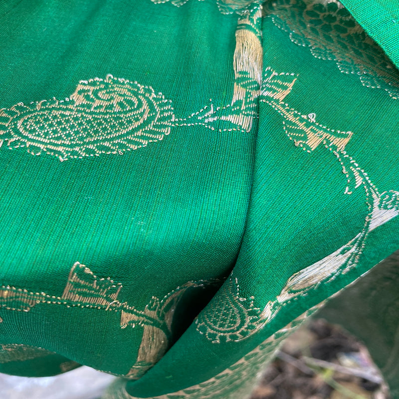 Handwoven Bottle Green Banarasi Silk Scarf with intricate detailing.
