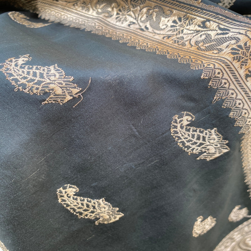 Timeless elegance in a classic black Banarasi handloom kadhwa silk scarf. Expertly handcrafted for sophistication and style. Shop now for luxury!