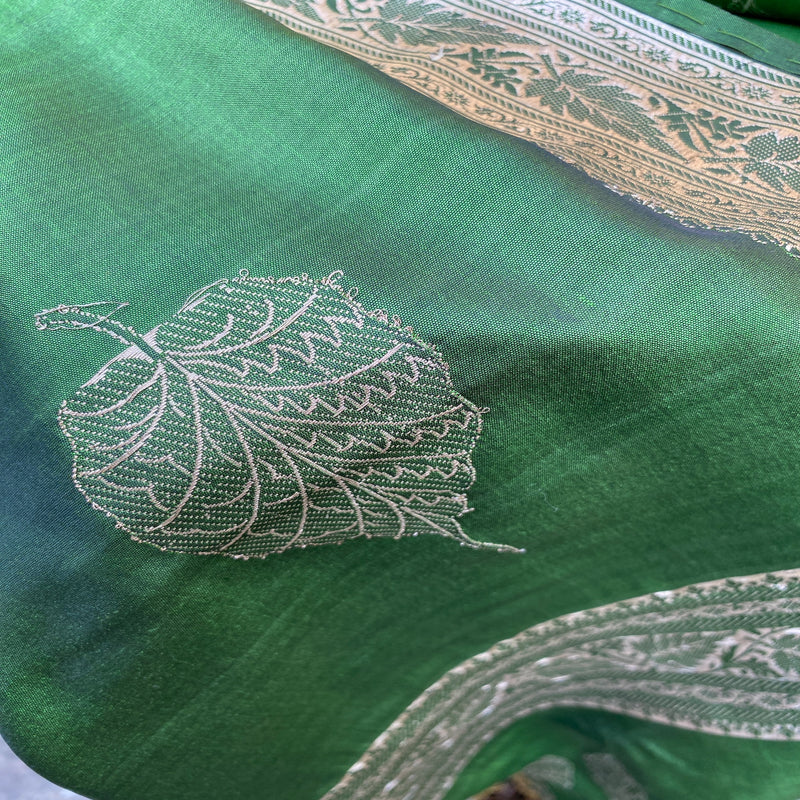 Add a touch of vibrancy to your wardrobe with our green Banarasi handloom kadhwa silk scarf. Shop now for timeless elegance and a pop of color!