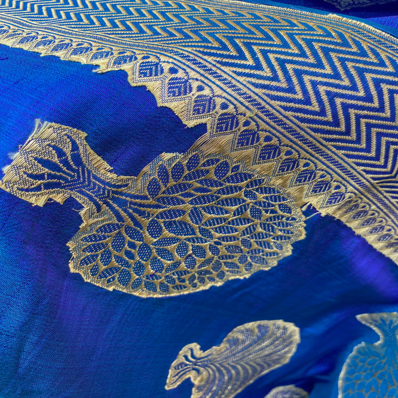 A regal royal blue Banarasi handloom kadhwa silk scarf. Intricate kadhwa work showcases timeless charm and sophistication. Shop for opulence and grace!