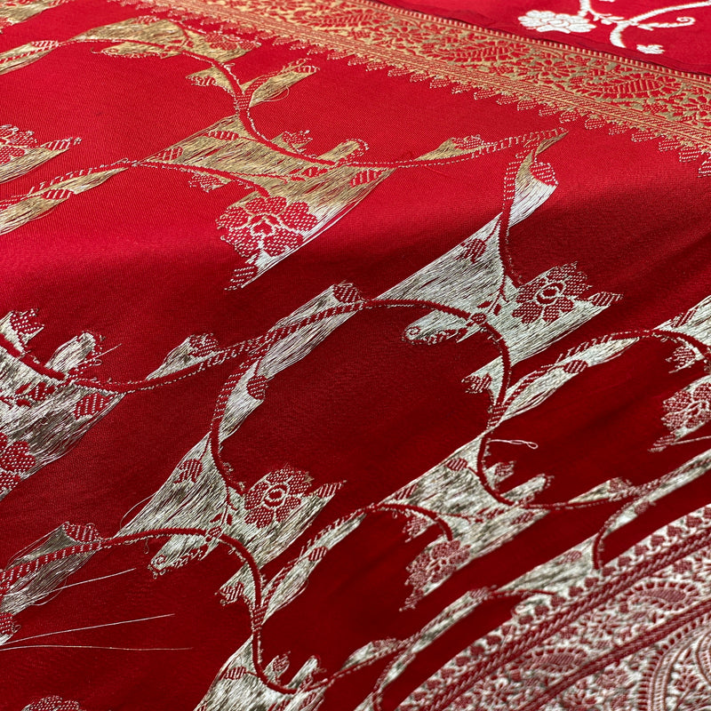 Elegant maroon Banarasi handloom kadhwa silk scarf. Intricate work exudes timeless beauty. Shop now for opulence and charm!