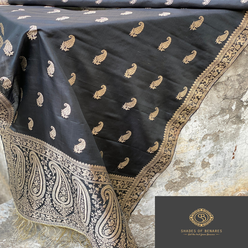 Elegant black Banarasi handloom kadhwa silk scarf, handcrafted with artisanal expertise for a touch of luxury and refinement.