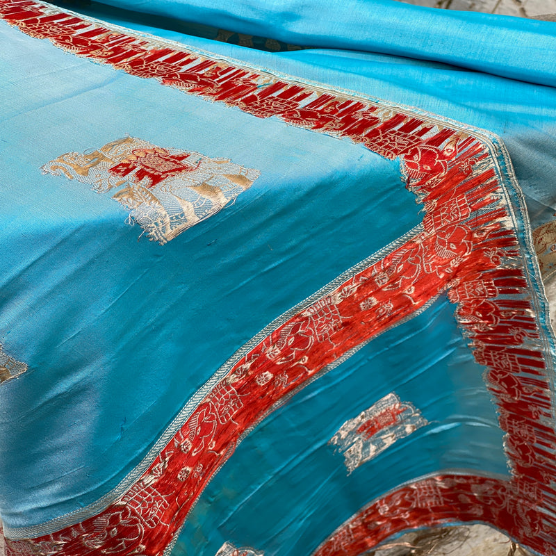 Elevate your style with our enchanting sky blue Minakari Banarasi handloom silk scarf. Handcrafted with intricate Minakari work, this versatile accessory exudes timeless beauty and sophistication. Shop now for opulence and charm! 