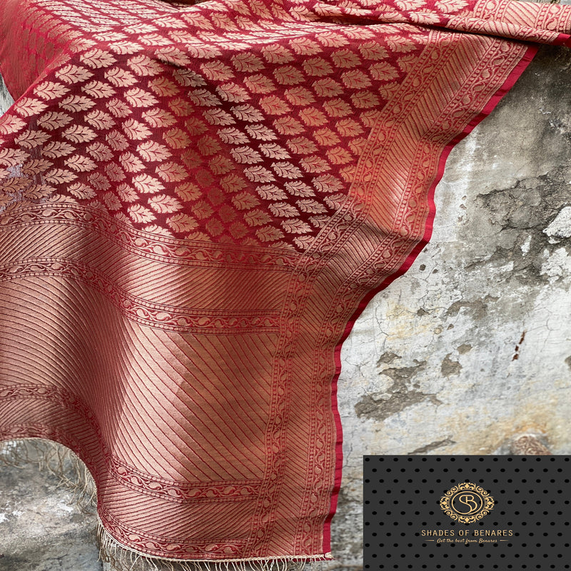 Luxurious maroon Banarasi silk brocade handloom scarf with intricate work. Elevate your ensemble with timeless charm and sophistication.