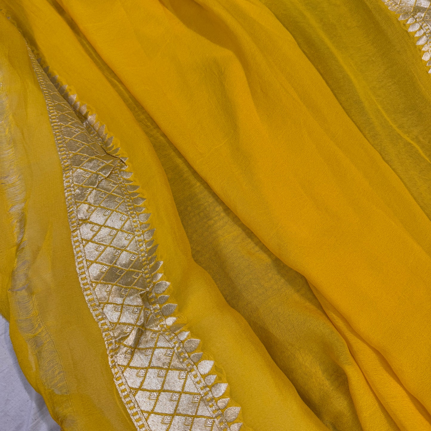 Yellow Pure Khaddi Georgette Handloom Banarasi Saree with All Over Handwoven Floral Jaal & Plain Blouse Piece – Hand Brush Dye by Shades Of Benares - banarasi - banarasi saree shop - banarasi saree manufacturers - banarasi saree wholesale - banaraasi sarees
