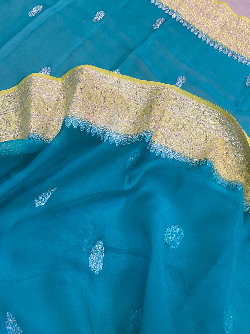 Handloom Banarasi Saree in Sea Blue and Lime, a luxurious creation by Shades of Benares.