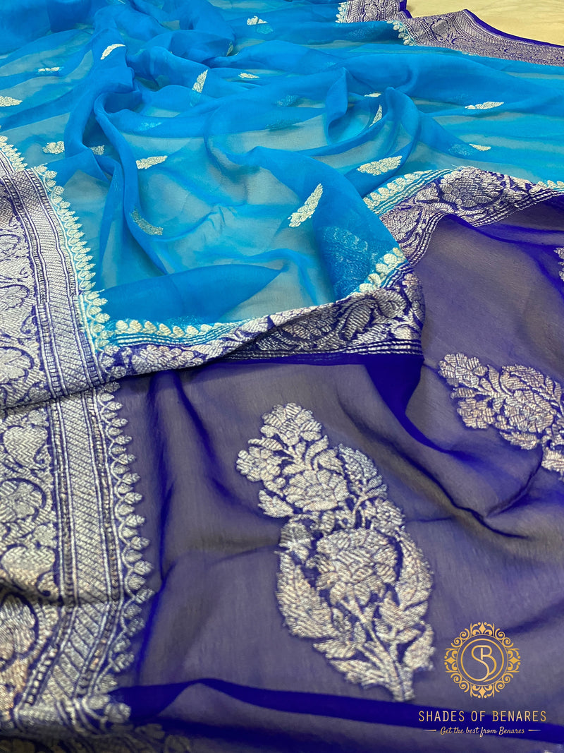 Classic blue pure Khaddi Chiffon handloom Banarasi saree by Shades of Benares, exuding timeless elegance.