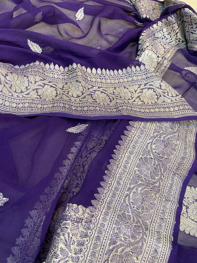 Regal Elegance: A purple pure Khaddi Chiffon Handloom Banarasi Saree with exquisite details by shades of benares.