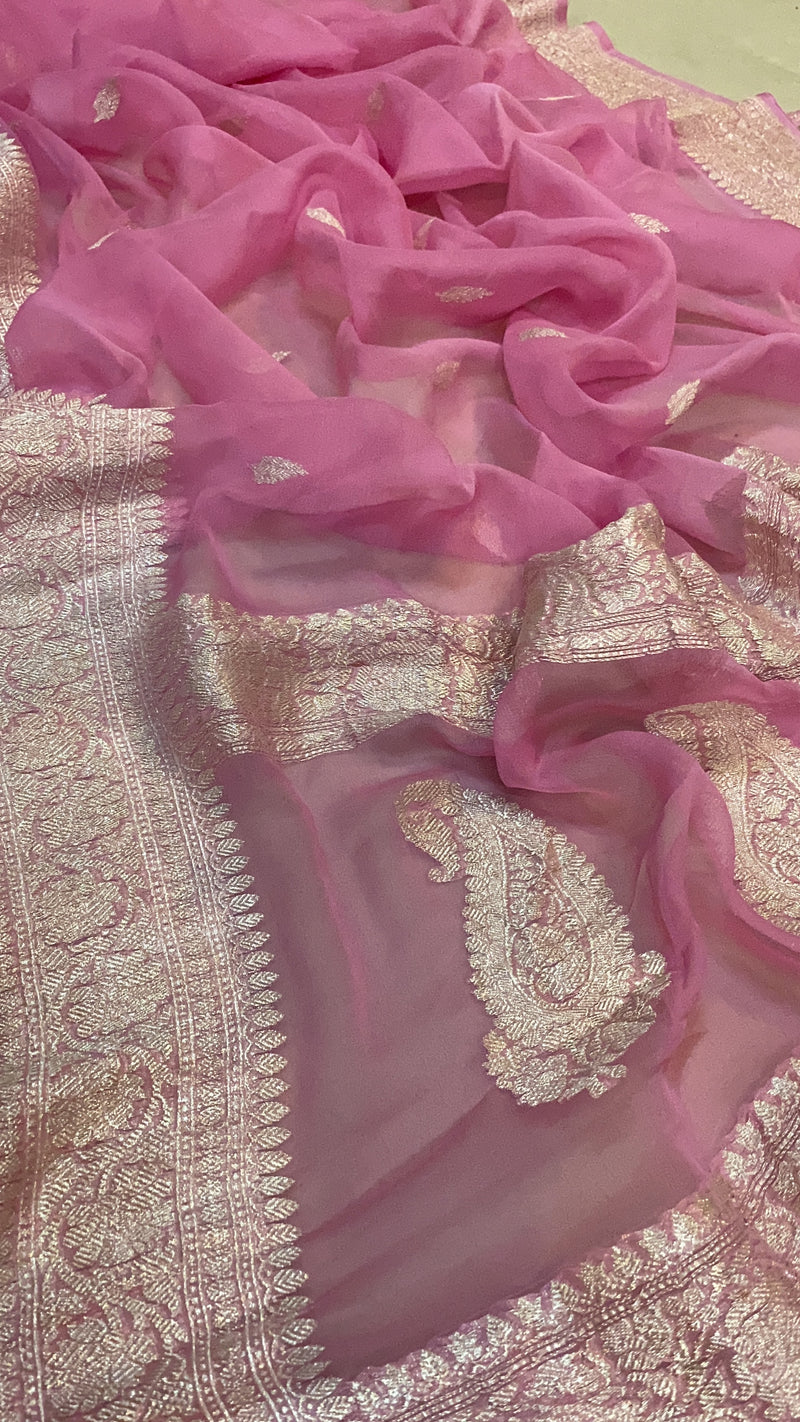 Shades of Benares presents a baby pink pure Khaddi chiffon saree, radiating graceful charm.