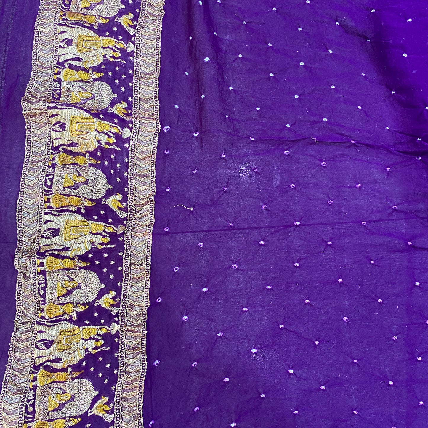 The Royal Amethyst: Purple Khaddi Georgette Bandhani Saree with Minakari Shikargaah Where two worlds of artistry collide, a masterpiece is born. by Shades Of Banaras - banarasi - banarasi saree shop - banarasi saree manufacturers - banarasi saree wholesale - banaraasi sarees