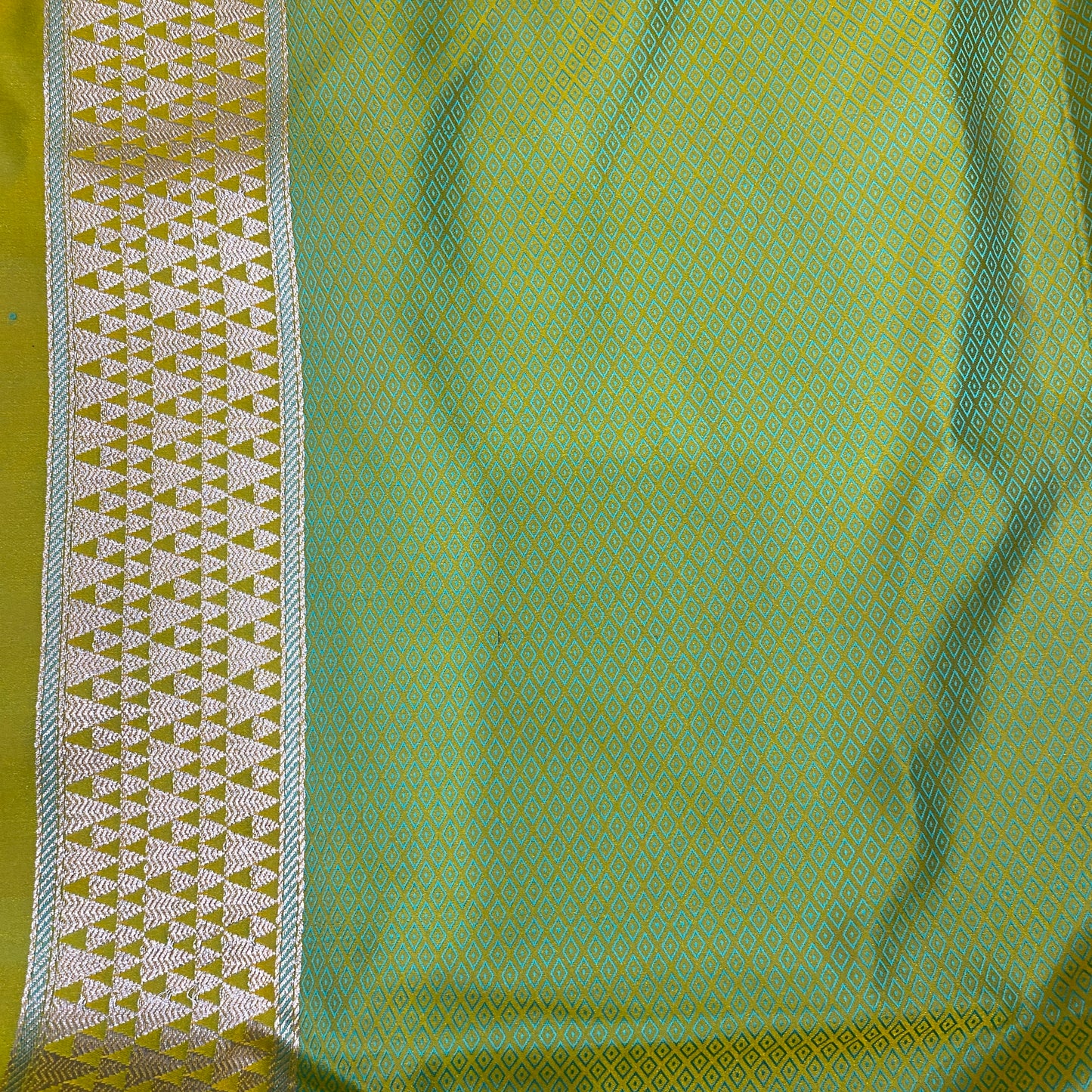 The Verdant Luxe: Emerald Striped Pure Satin Silk Banarasi Saree by Shades Of Banaras - banarasi - banarasi saree shop - banarasi saree manufacturers - banarasi saree wholesale - banaraasi sarees - banarasi sari - banarasi saris - silk saree - silk sari - wedding saree - wedding sari - designer sari - wedding collection - gifting