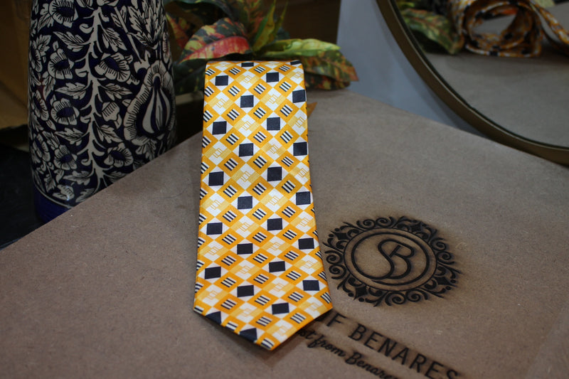 Stylish yellow, black, and white Banarasi satin silk printed neck tie by Shades of Benares.
