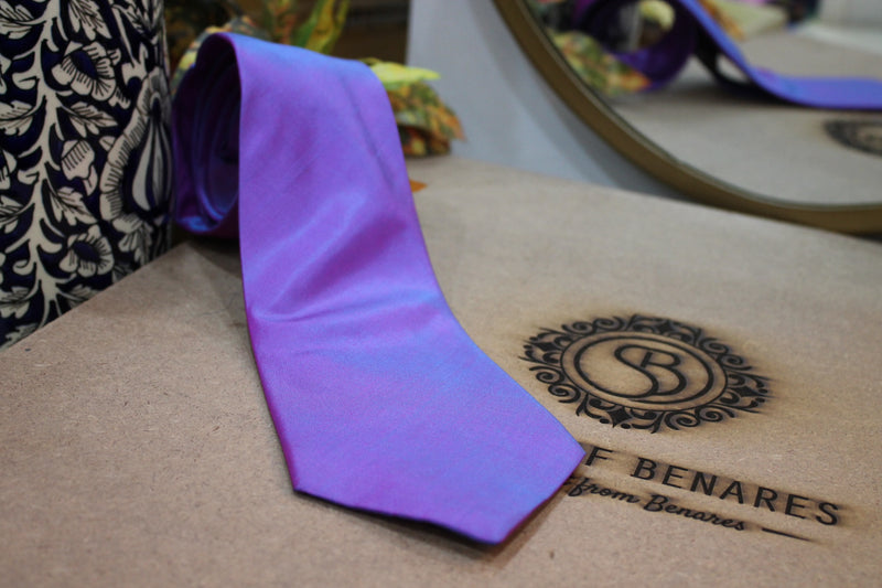 Regal purple silk neck tie by Shades of Benares. Perfectly plain and pure, this Banarasi satin accessory exudes elegance.