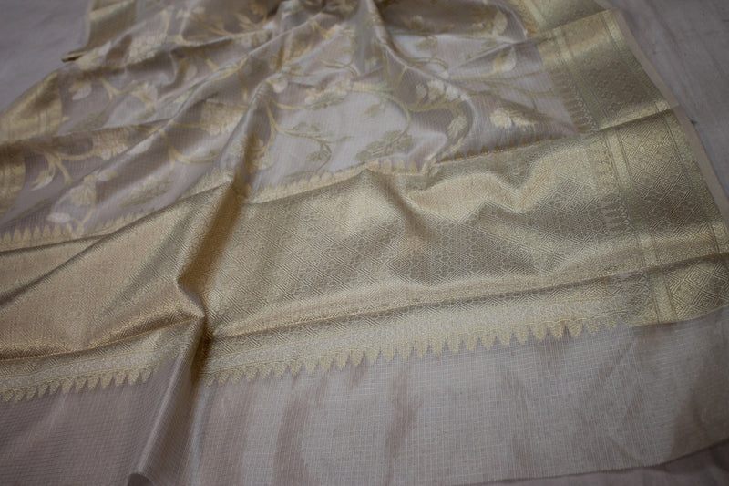 Exquisite Creme Pure Tissue Silk Handloom Banarasi Sari by Shades of Benares. beautiful cream silk sari by Shades of Benares.