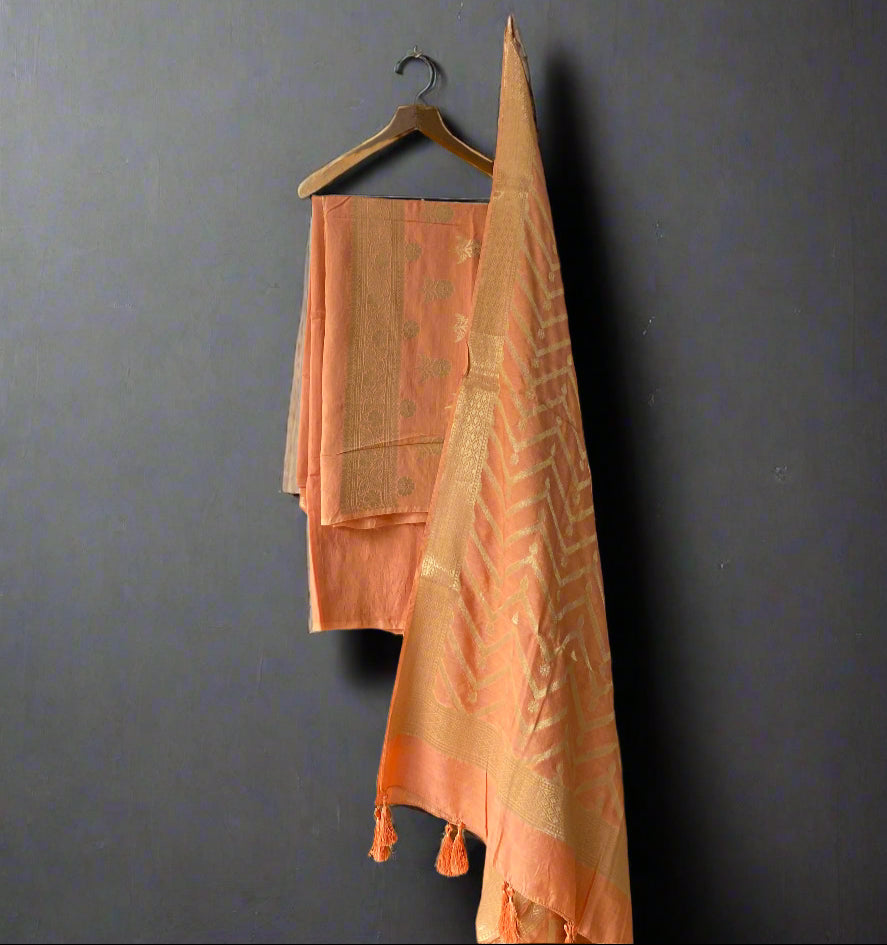 Peach Banarasi Soft Silk Handloom Unstitched Suit Set (3 Pc) by Shades Of Banaras - banarasi - banarasi saree shop - banarasi saree manufacturers - banarasi saree wholesale - banaraasi sarees