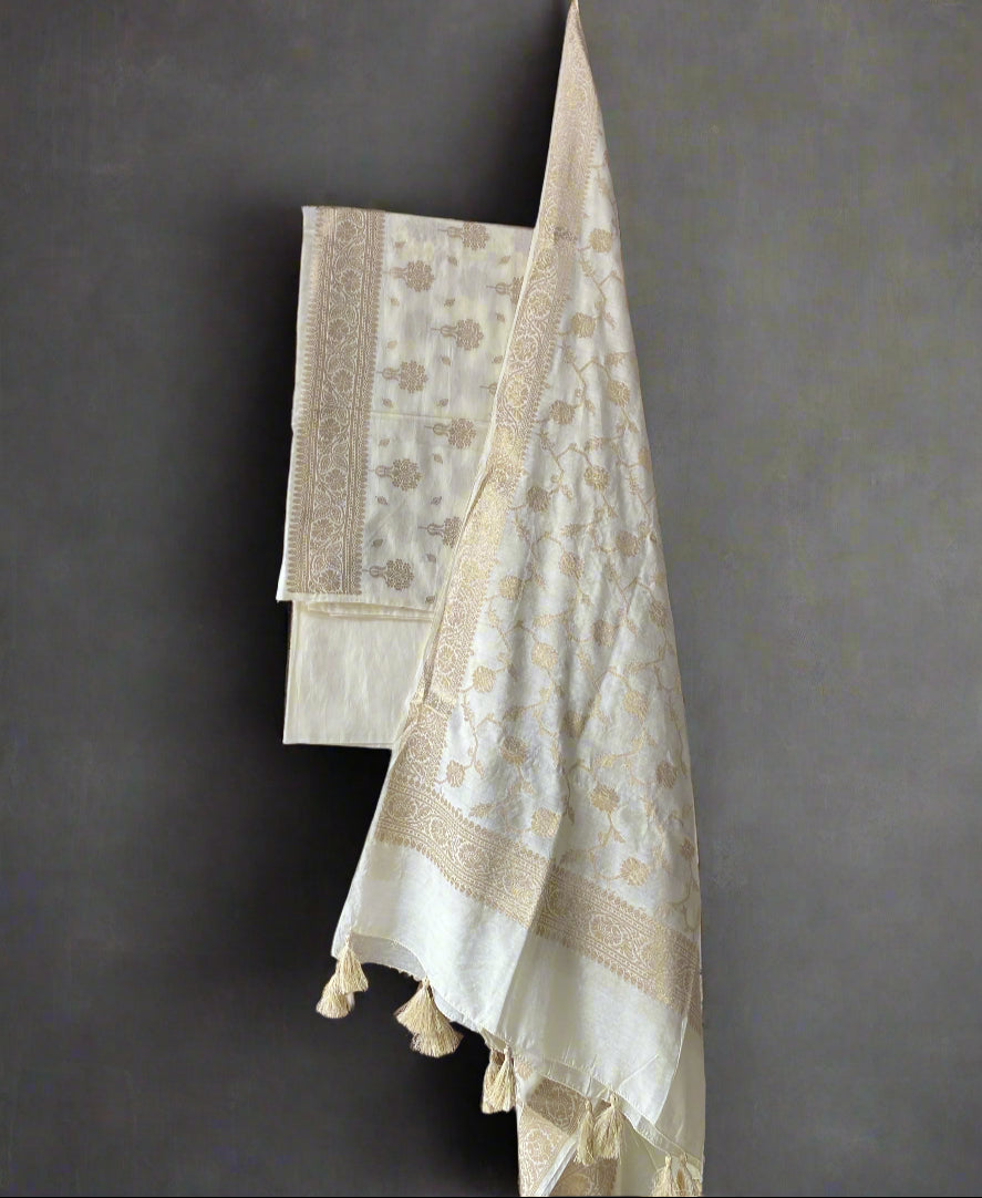 Off White Banarasi Soft Silk Handloom Unstitched Suit Set (3 Pc) by Shades Of Banaras - banarasi - banarasi saree shop - banarasi saree manufacturers - banarasi saree wholesale - banaraasi sarees
