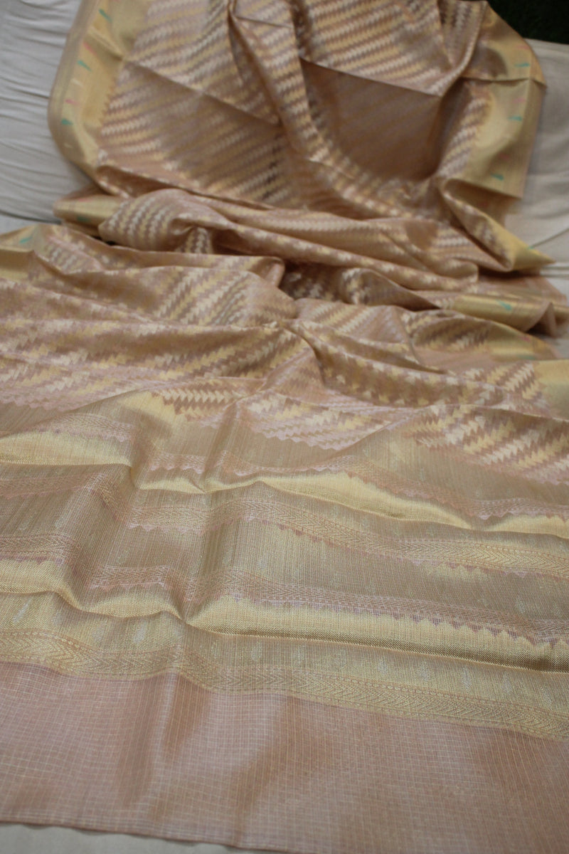 Elegant baby pink sari made of pure tissue silk, handloomed by Shades of Benares.