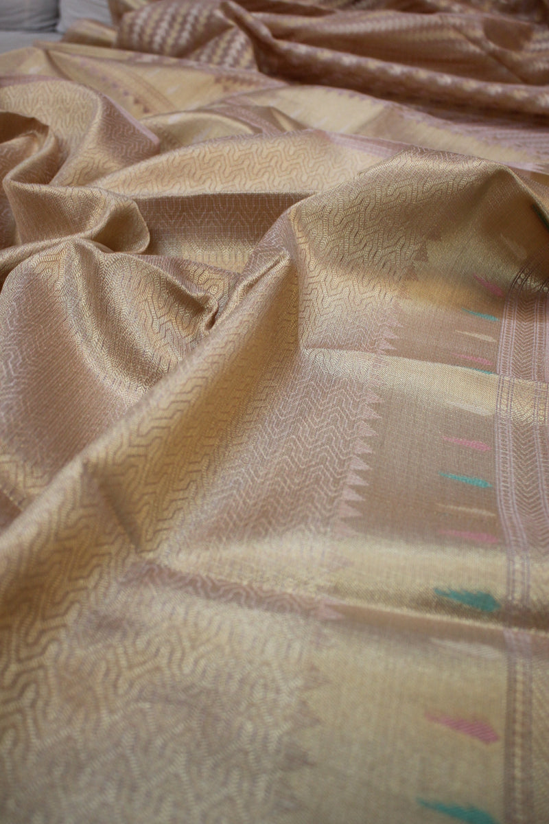 Shades of Benares' exquisite baby pink pure tissue silk handloom Banarasi sari, radiating elegance.