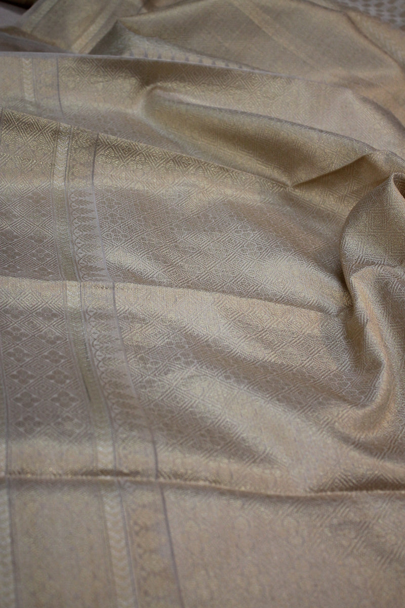 Elegant beige pure tissue silk handloom Banarasi sari by Shades of Benares.