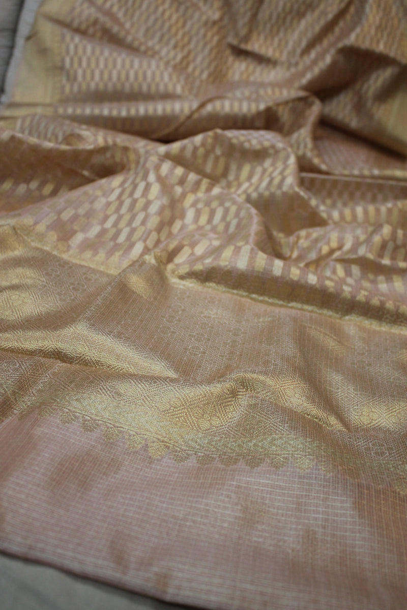 Elevate your style with this luxurious pink pure tissue silk sari featuring shades of Benares.