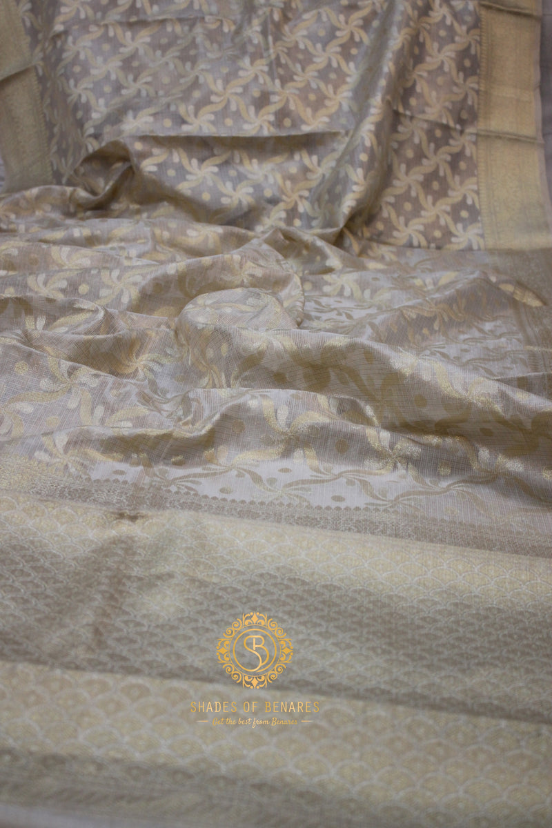 Off-White Pure Tissue Silk Sari by Shades of Benares: A timeless elegance in traditional Indian attire.