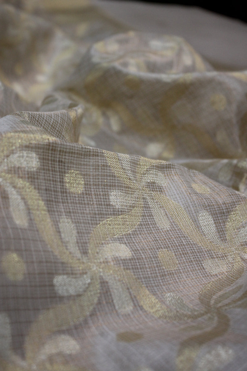 Elegant Off-White Pure Tissue Silk Sari from Shades of Benares: A classic beauty in ethnic fashion.
