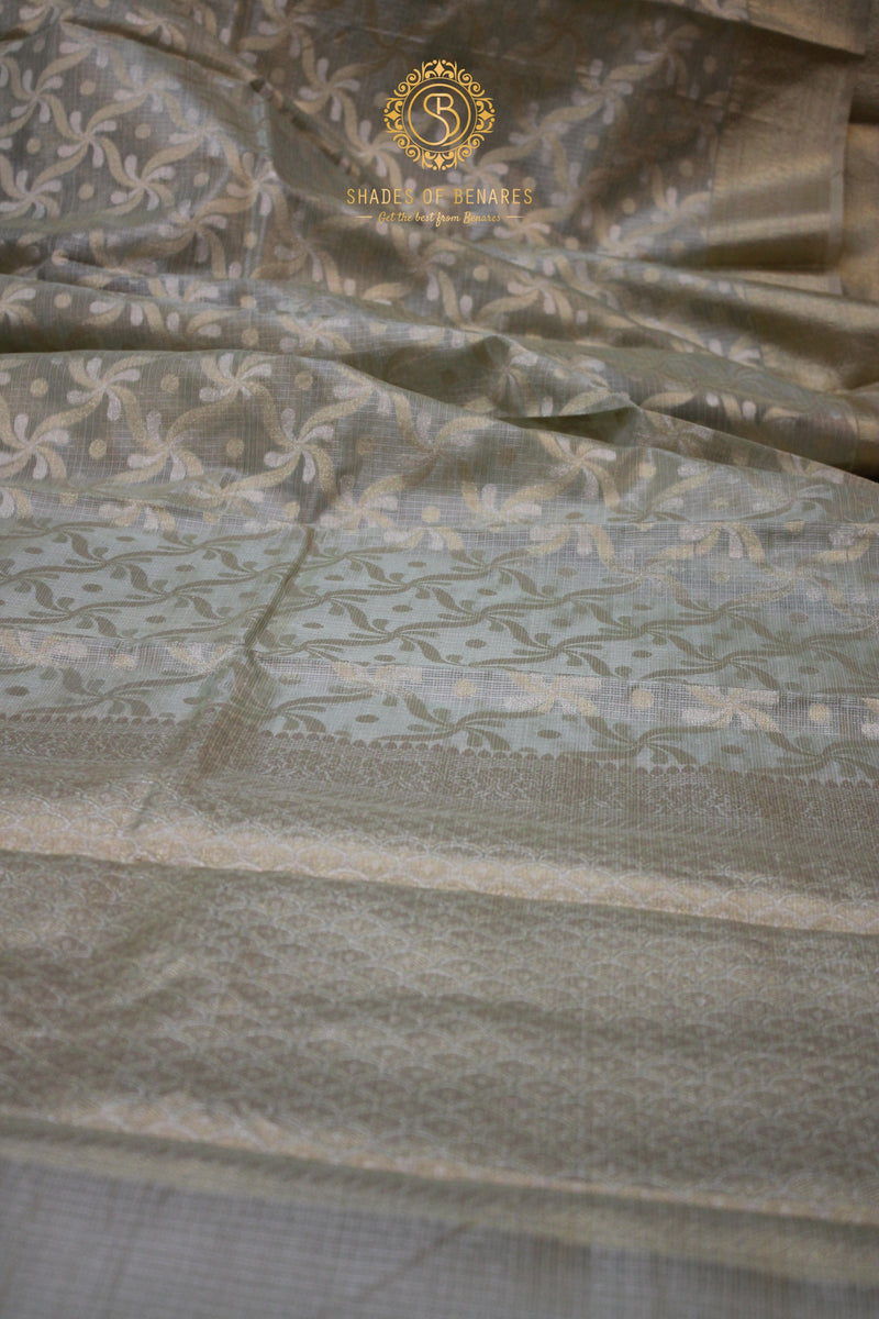 Elegant Mint Green Pure Tissue Silk Sari: A timeless masterpiece by Shades of Benares.