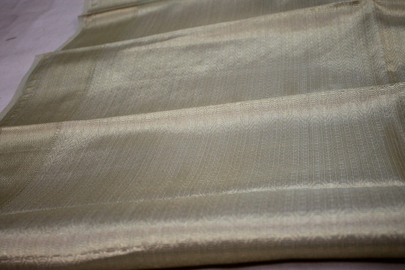 Mint green Banarasi Tissue Silk Saree by shades of benares, a luxurious addition to your collection.