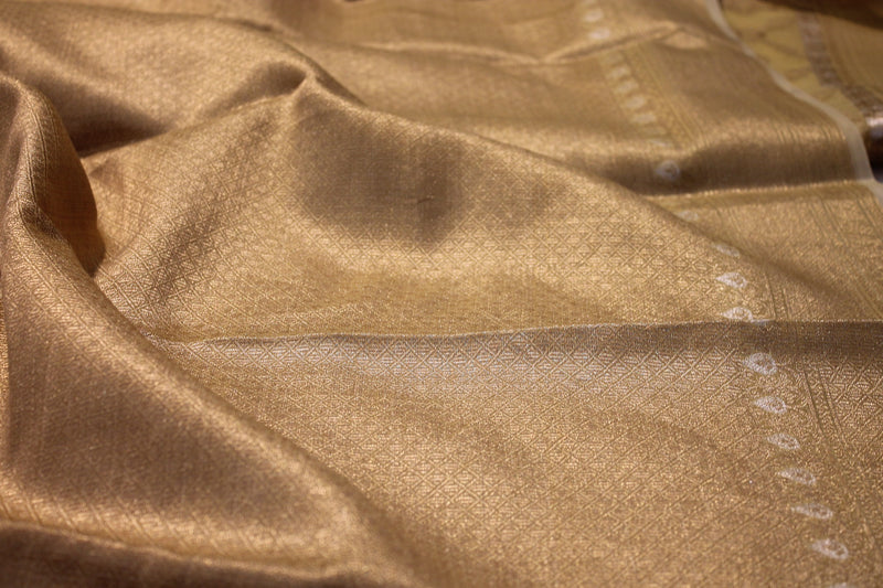 Yellow tissue silk saree by Shades of Benares, radiantly beautiful.
