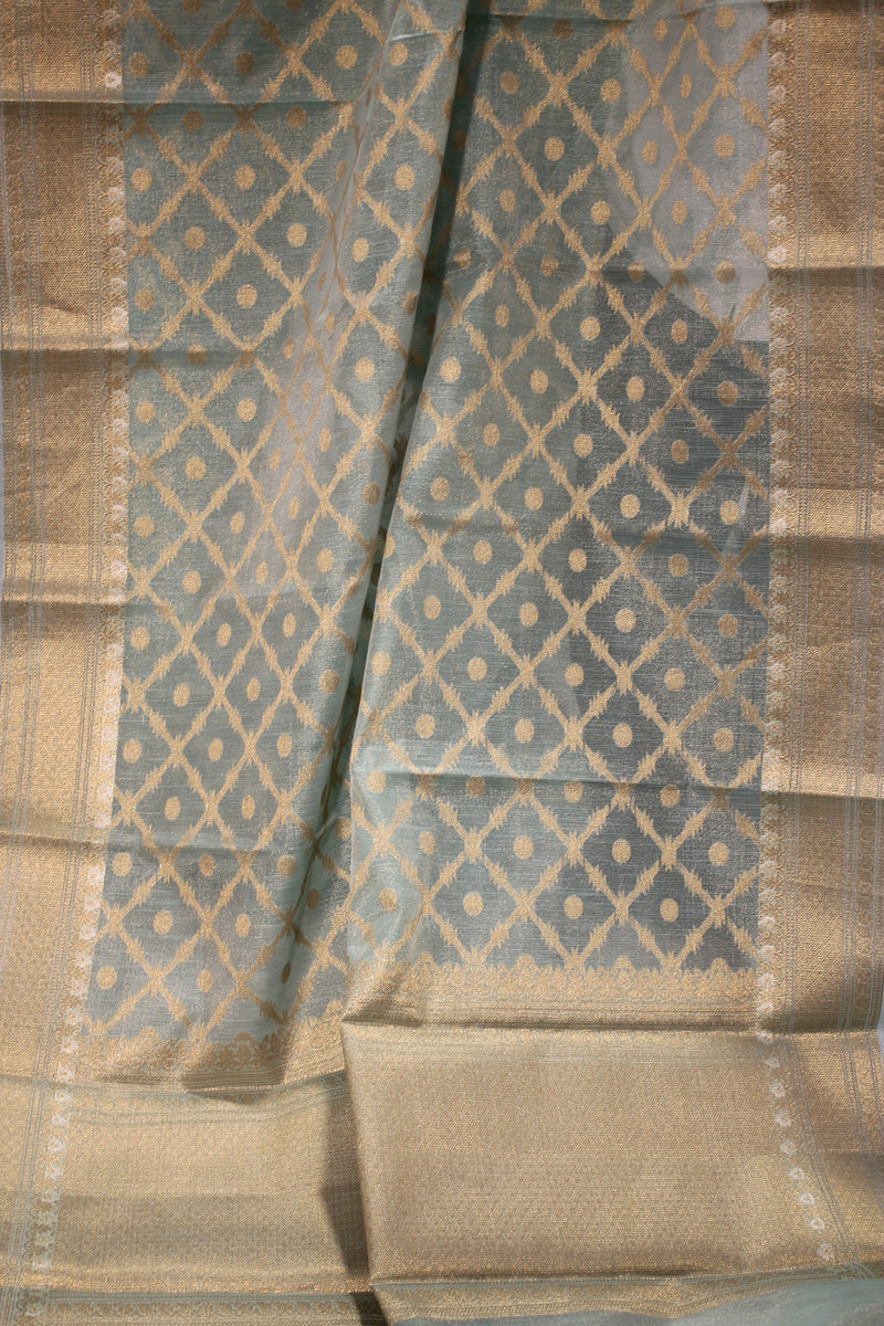 Serene pastel blue tissue silk saree by Shades of Benares.