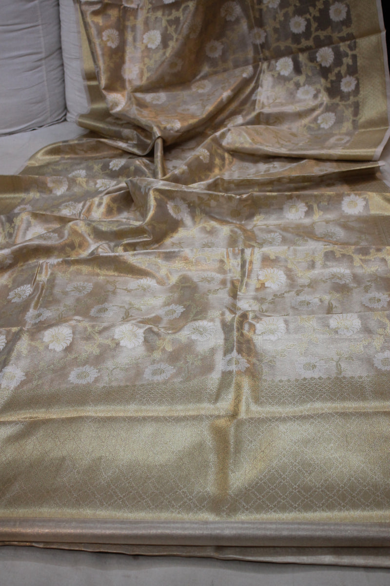 Limited Edition Beige Pure Tissue Silk Saree from shades of benares exudes sophistication.