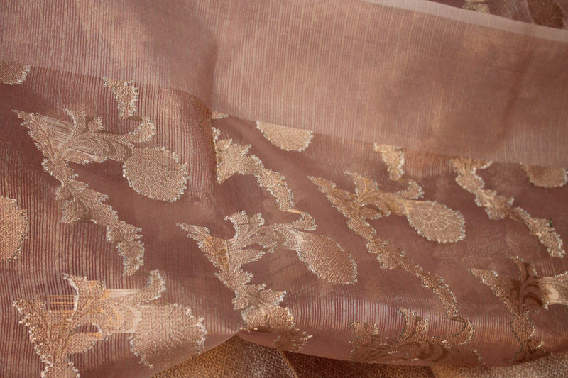 Pink silk saree with gold jaal design, handwoven by shades of benares.