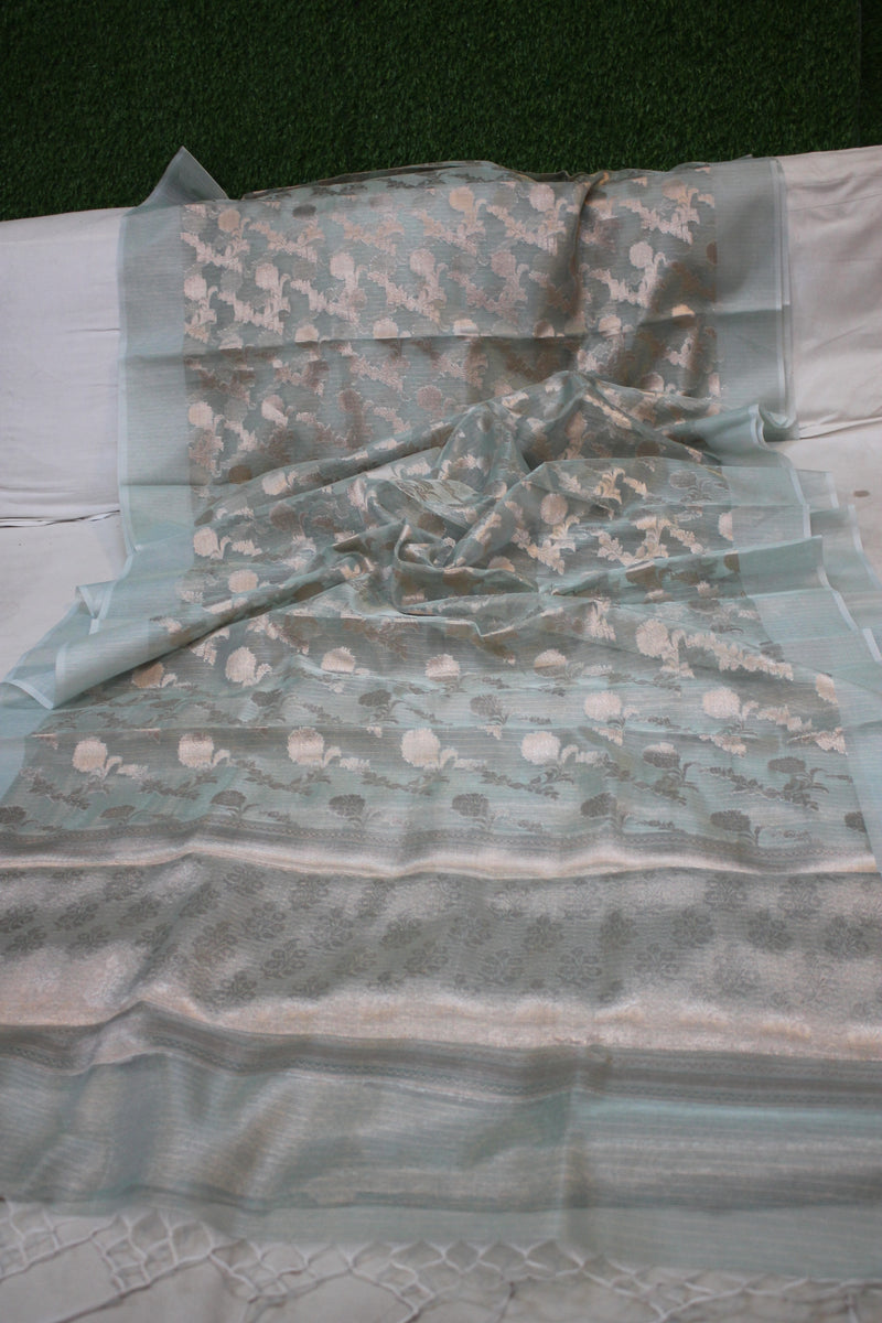 Sea green pure tissue silk saree with handwoven gold jaal design by Shades of Benares.