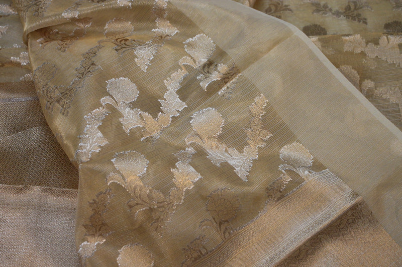 Stylish Crème Pure Tissue Silk Banarasi Saree featuring Gold Jaal Design from Shades of Benares.
