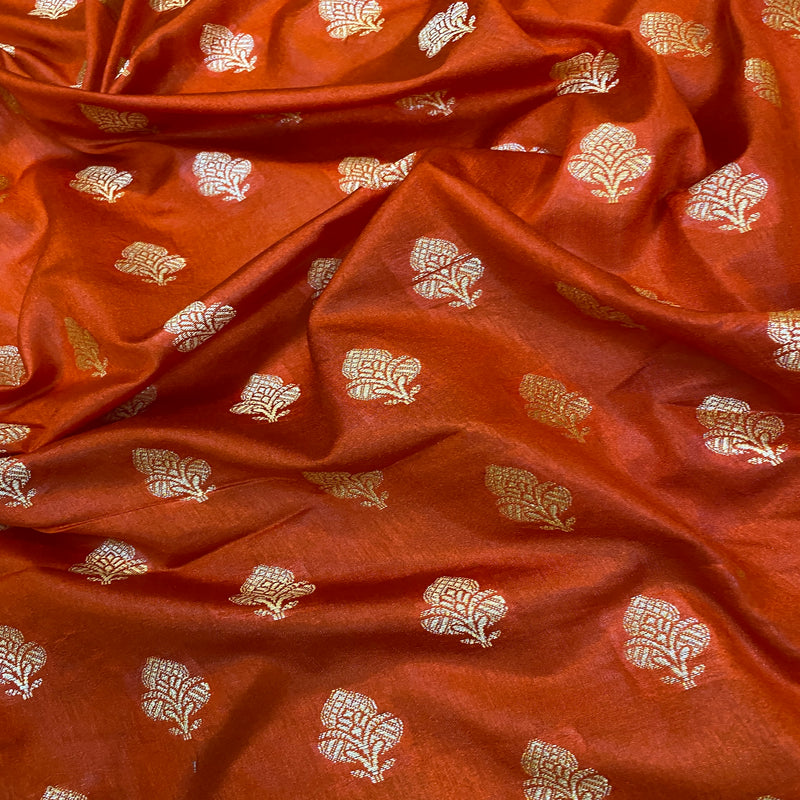 Warm rust orange handloom crepe Banarasi silk sari; elegant, sophisticated, and artisanal fusion. Perfect for formal gatherings and cultural celebrations. Shop now and elevate your style!