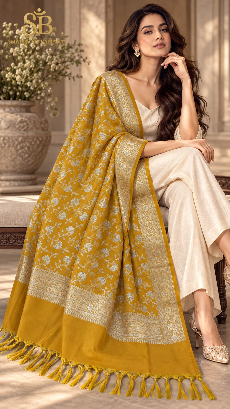 Amber mustard katan soft silk Banarasi handloom dupatta with all-over cutwork jaal from Banaras, styled over a cream suit