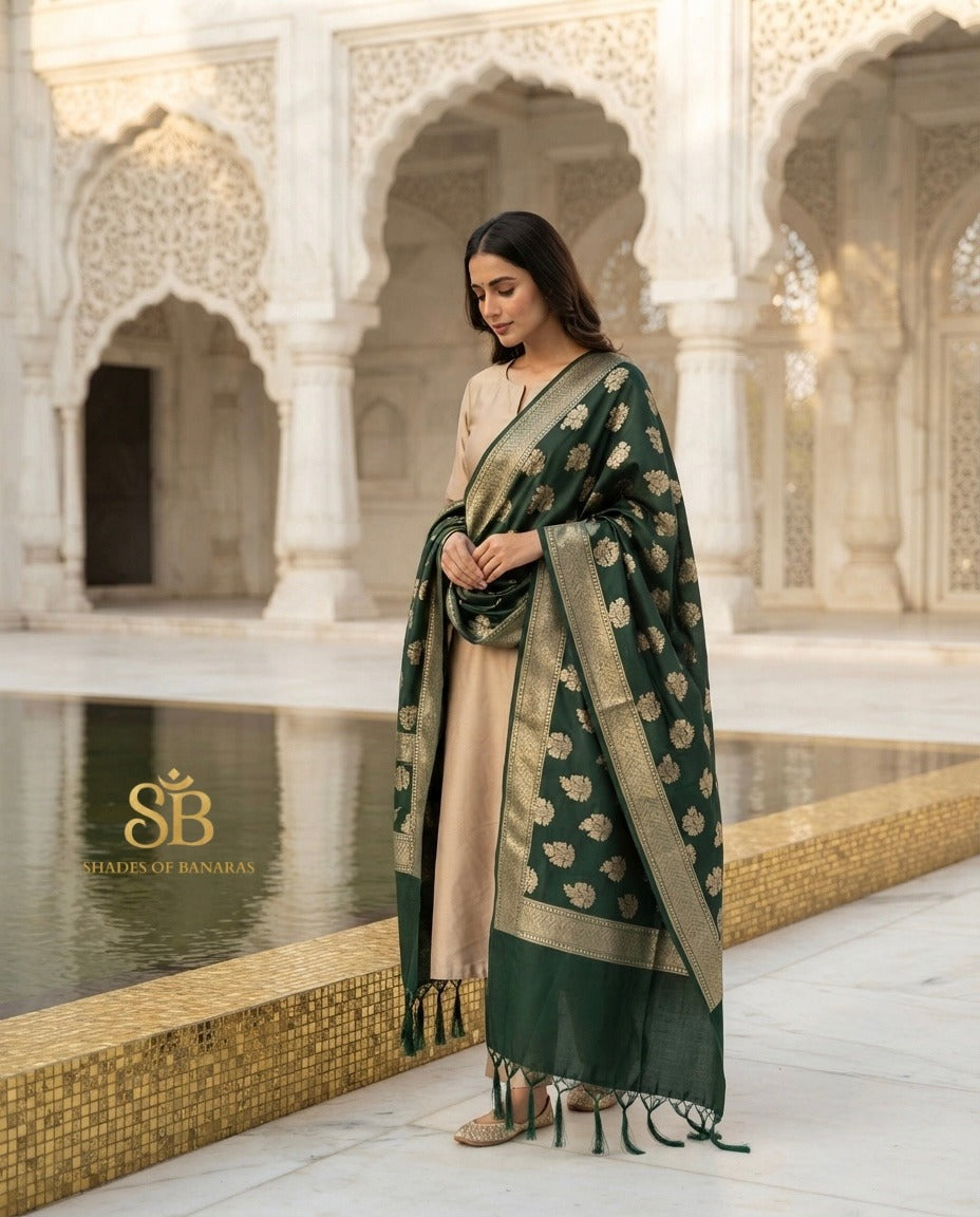 Forest heritage green katan soft silk Banarasi handloom dupatta with gold cutwork butis from Banaras, worn over a beige suit