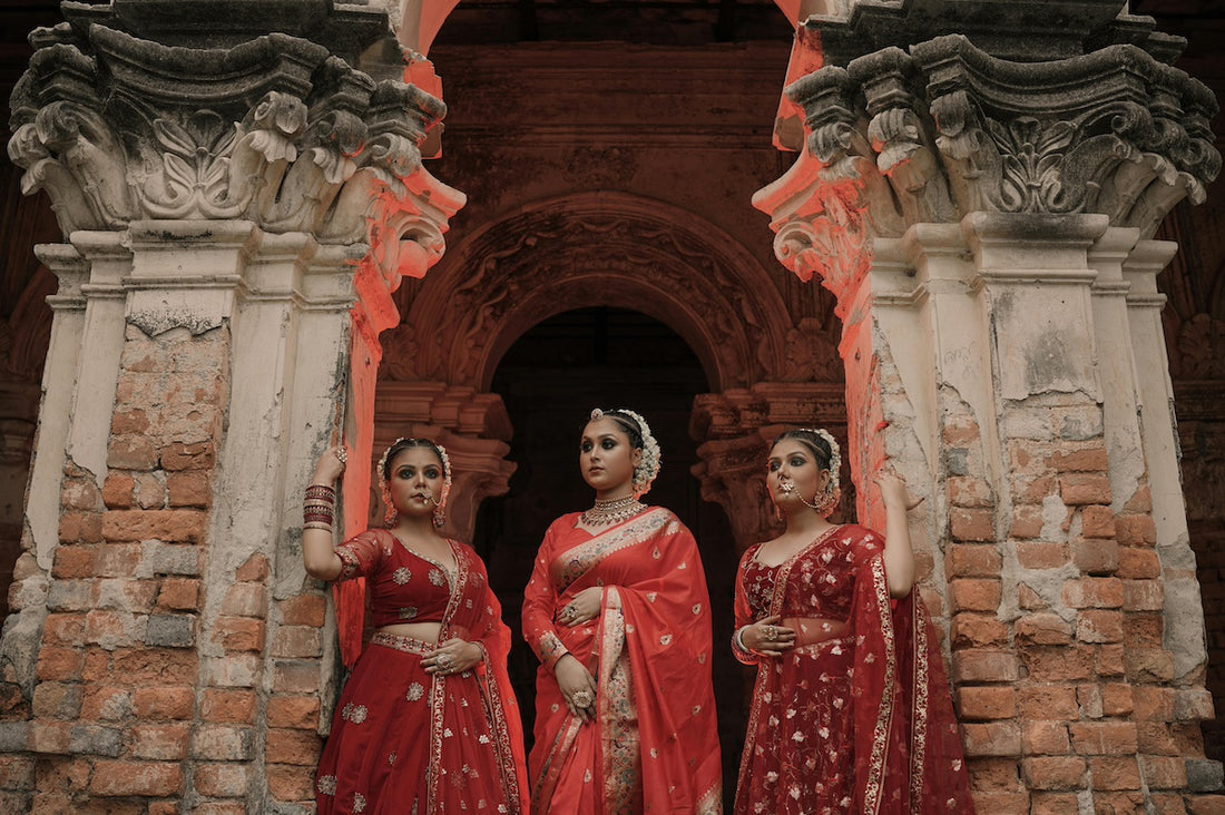 Indian bride in a Banarasi silk saree, adorned with traditional jewelry and intricate henna designs.