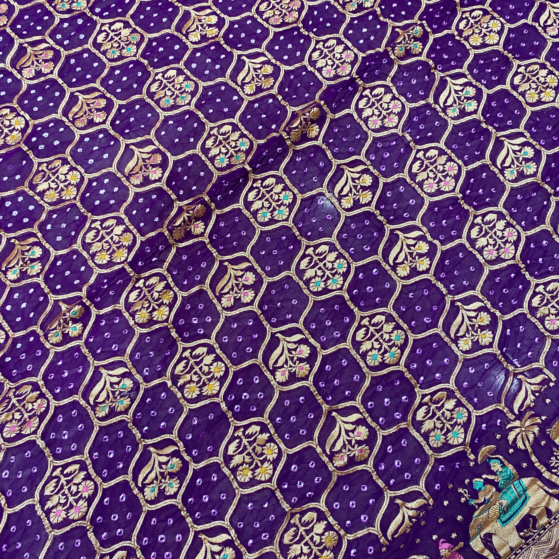 The Royal Amethyst: Purple Khaddi Georgette Bandhani Saree with Minakari Shikargaah Where two worlds of artistry collide, a masterpiece is born. by Shades Of Banaras - banarasi - banarasi saree shop - banarasi saree manufacturers - banarasi saree wholesale - banaraasi sarees