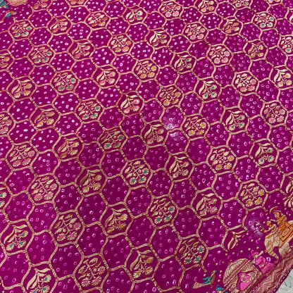 The Rani’s Decree: Pink Khaddi Georgette Bandhani Saree with Minakari Shikargaah A symphony of heritage, woven in the color of celebration by Shades Of Banaras - banarasi - banarasi saree shop - banarasi saree manufacturers - banarasi saree wholesale - banaraasi sarees