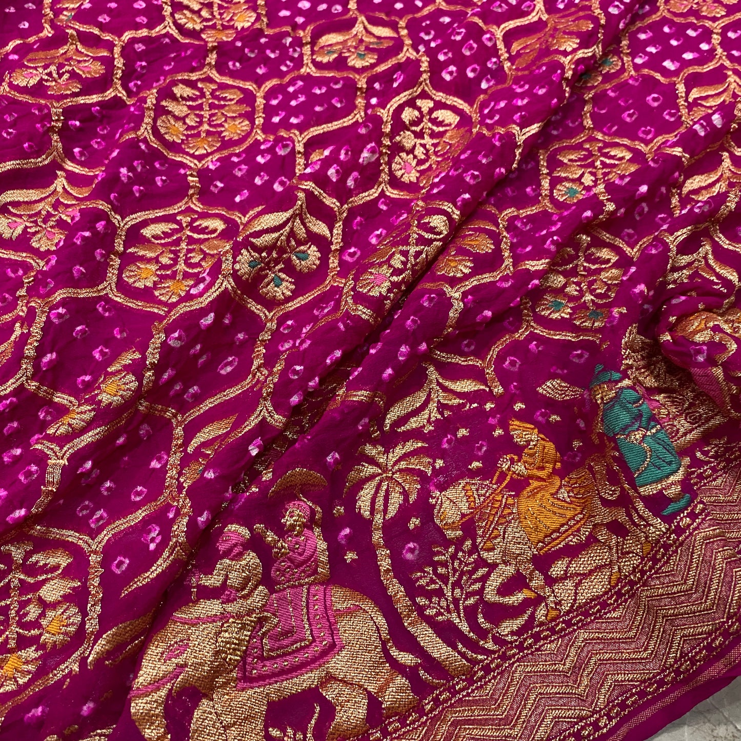 The Rani’s Decree: Pink Khaddi Georgette Bandhani Saree with Minakari Shikargaah A symphony of heritage, woven in the color of celebration by Shades Of Banaras - banarasi - banarasi saree shop - banarasi saree manufacturers - banarasi saree wholesale - banaraasi sarees