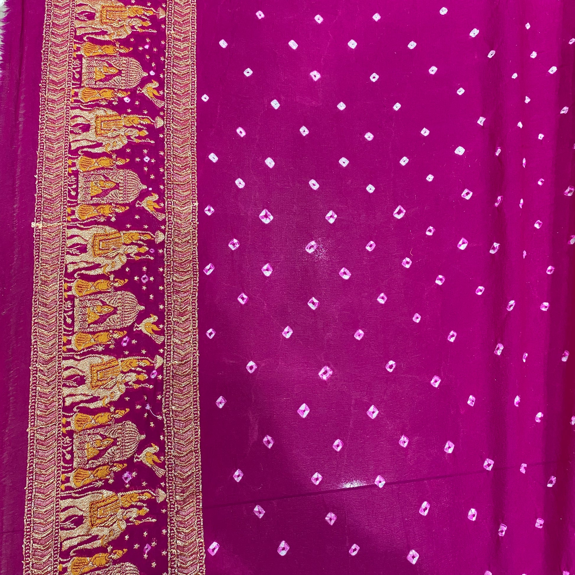 The Rani’s Decree: Pink Khaddi Georgette Bandhani Saree with Minakari Shikargaah A symphony of heritage, woven in the color of celebration by Shades Of Banaras - banarasi - banarasi saree shop - banarasi saree manufacturers - banarasi saree wholesale - banaraasi sarees