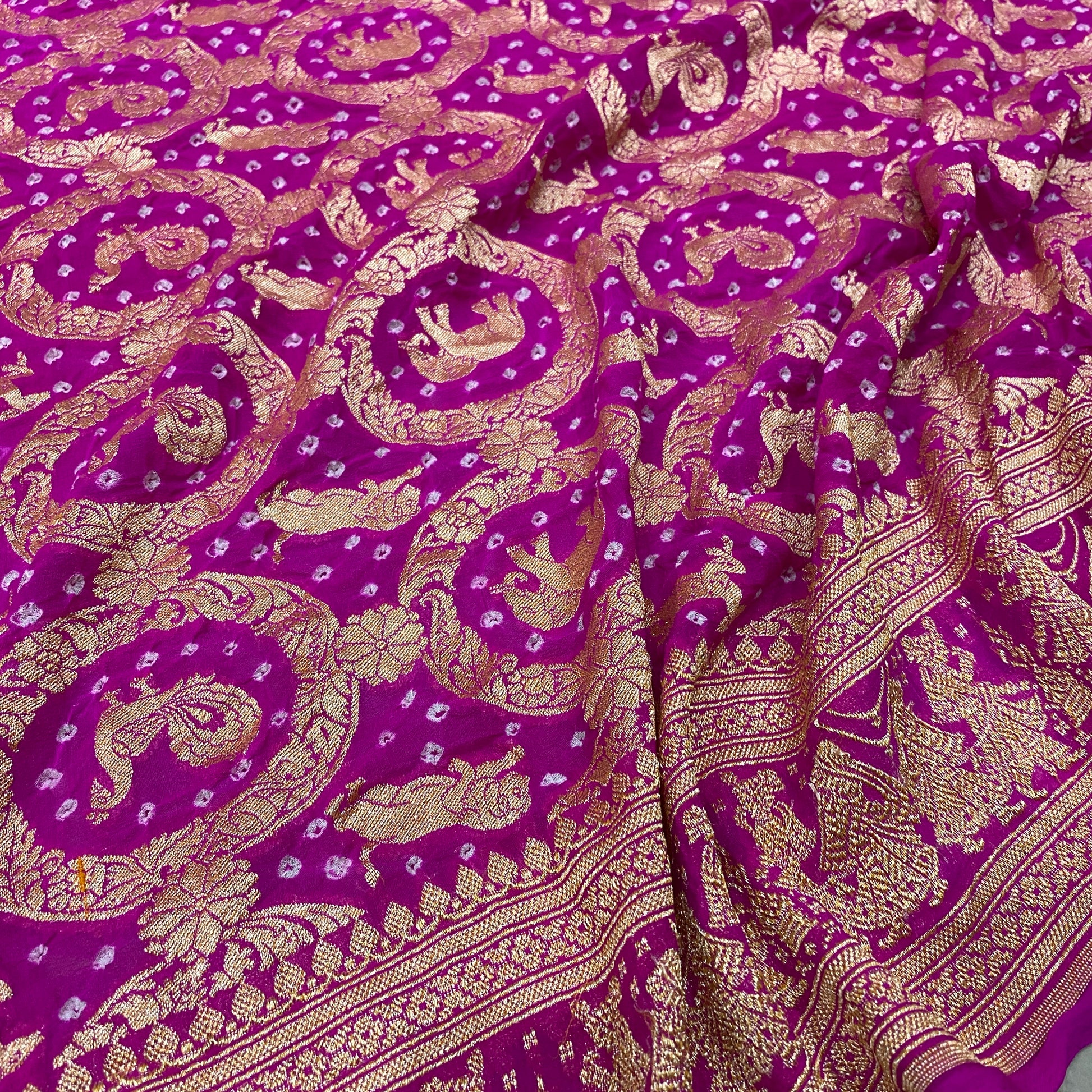 The Royal Gulabi Shikargaah: Pink Khaddi Georgette Bandhani Banarasi Saree by Shades Of Banaras - banarasi - banarasi saree shop - banarasi saree manufacturers - banarasi saree wholesale - banaraasi sarees