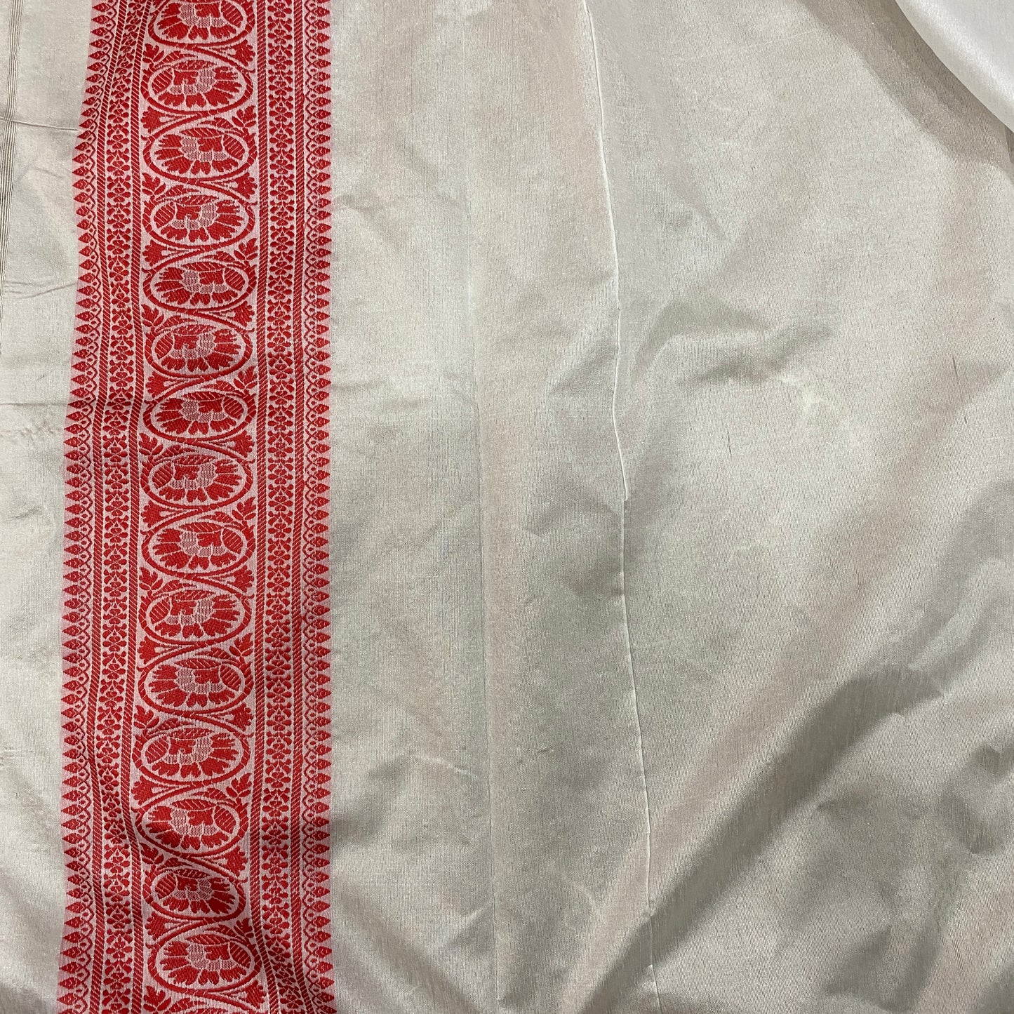 The Imperial Crimson Leaf: Luxe Hand-Embroidered White & Red Pure Cotton Banarasi Sari by Shades Of Banaras - banarasi - banarasi saree shop - banarasi saree manufacturers - banarasi saree wholesale - banaraasi sarees - banarasi sari - banarasi saris - silk saree - silk sari - wedding saree - wedding sari - designer sari - wedding collection - gifting