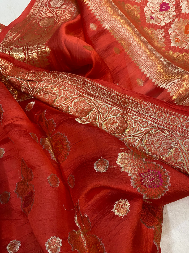 Unmatched Elegance: The Reddish Orange Banarasi Saree