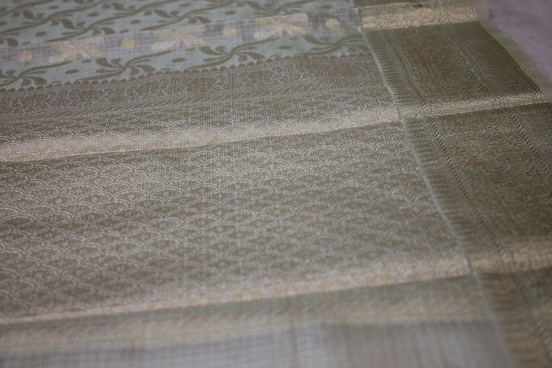 Elegant Mint Green Pure Tissue Silk Sari: A timeless masterpiece by Shades of Benares.