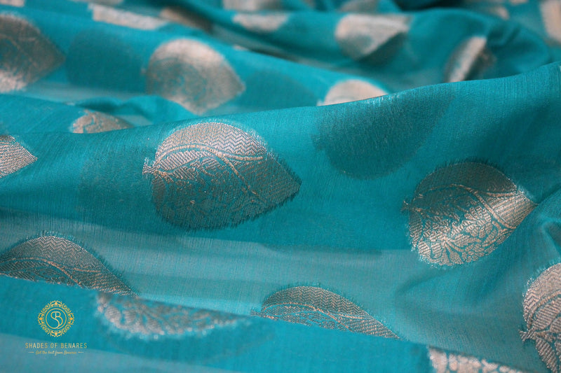 Blue Kora Organza Handloom Banarasi Saree by Shades of Benares, a captivating piece of traditional elegance.