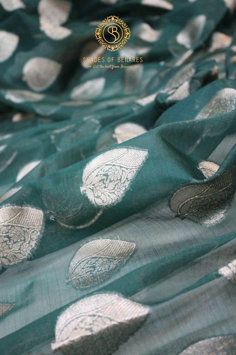 Enchanting Bottle Green Kora Organza Handloom Banarasi Saree by shades of benares - a mesmerizing masterpiece.