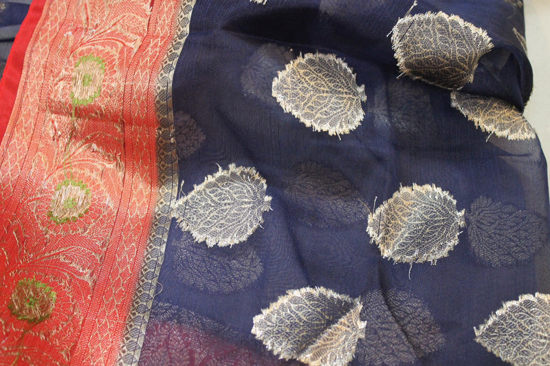 Stunning Navy Blue Kora Organza Handloom Banarasi Saree with Red Border by Shades of Benares.